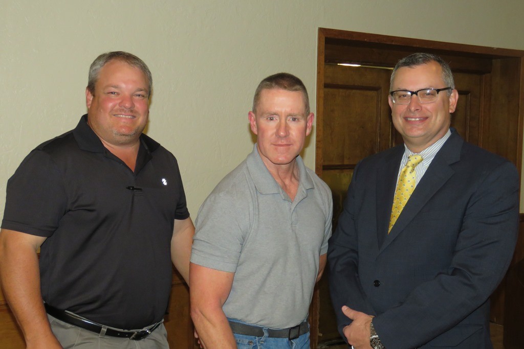 Presenting the 20 year employee service award to Lloyd Wallace was Darryl Day, System Manager of Plant Operations (left) and Shawn Barnett, Market President.  (Other 20 year award recipients not pictured: Deana Davis, Mary Eberlan, Sheryl Hamilton, Deborah McDaniel and Shane Waller)