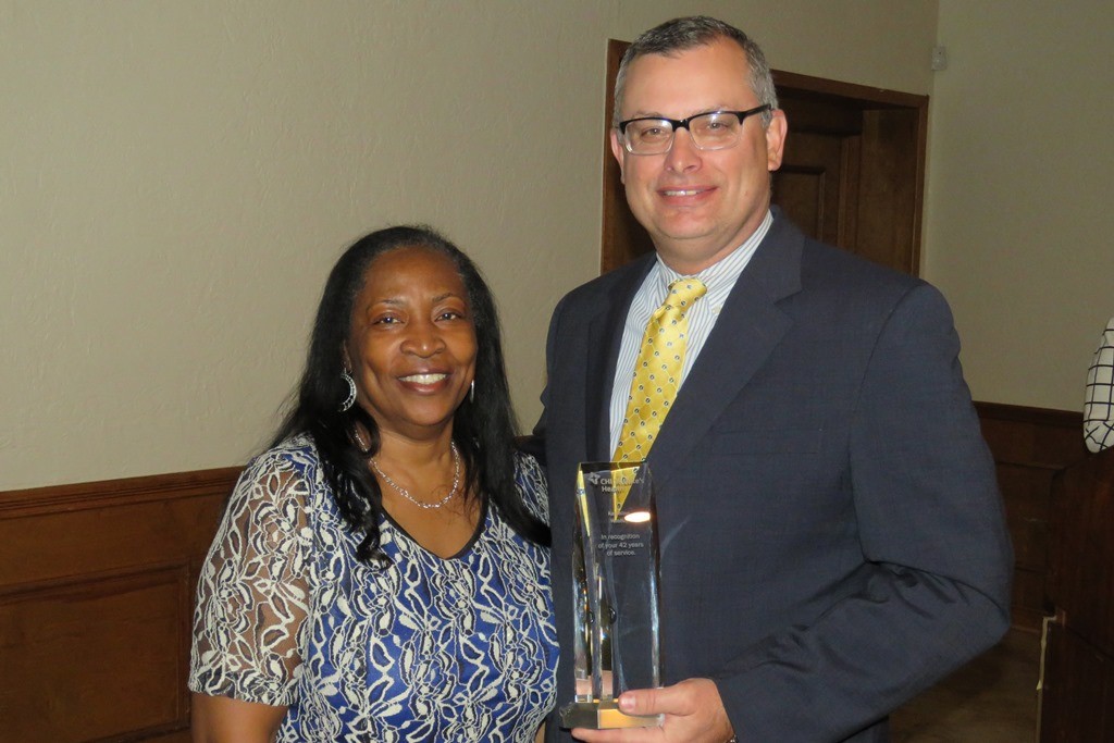 Recent retirees of CHI St. Luke’s Health Memorial were recognized for their years of service at the Employee Service Awards. Shawn Barnett, Market President, thanks Katheline Westley for her years of service. (Other retirees not pictured: Beth Mays, Linley Ham, Robert Bowers, Betty Parris, Brenda King, Betty Langston and Jo Teer)