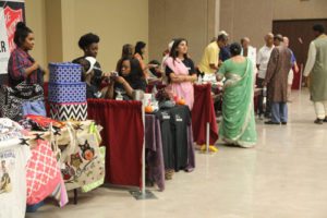 People peruse the booths set up by local shop owners and peddlers, personal individuals celebrating and informing about their culture, and organizations at the Heritage Festival.