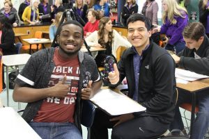 LHS students Keynnon Medlack, left, and Roberto Hernandez give a thumbs as they celebrate with the Prize Patrol.