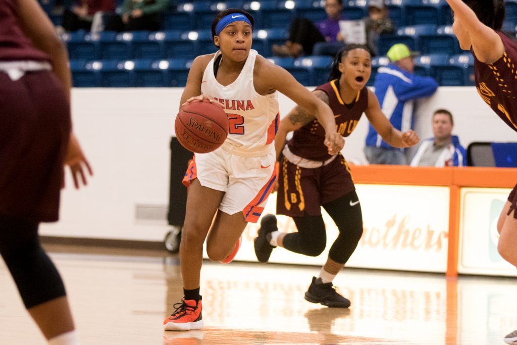 	Angelina College’s Mikayla Bailey (22) pushes the ball up the floor during Saturday’s game against Bossier Parish Community College. The Lady Roadrunners rolled to an 89-57 win at Shands Gymnasium. (Daisy de Boer/AC Athletics photo)