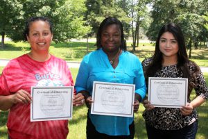 Angelina College Alpha Beta Gamma members recently received scholarships following the group’s fund raiser. Pictured are (L-R) Sophia Reyes, Stacey Woods and Paolo Morales Delgado. (AC Press photo by Gary Stallard)