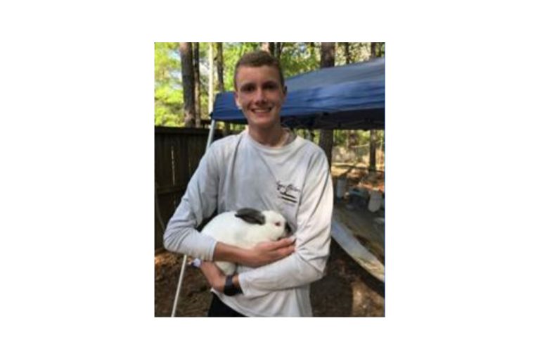 Lufkin Student, Grant Ashby, Shows Rabbits at the Angelina County Fair
