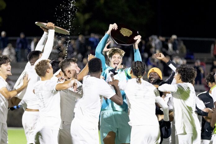 Celebration with Trophy 1_AC Soccer vs Tyler_District Championship_11_3_2023