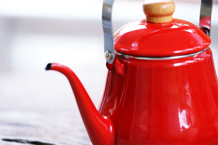 red-kettle-enamel-tea-pot-closeup-blur-background-2023-11-27-05-29-26-utc 2